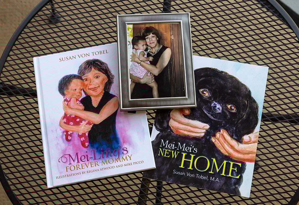 Book covers that were illustrated to match a photo of Susan