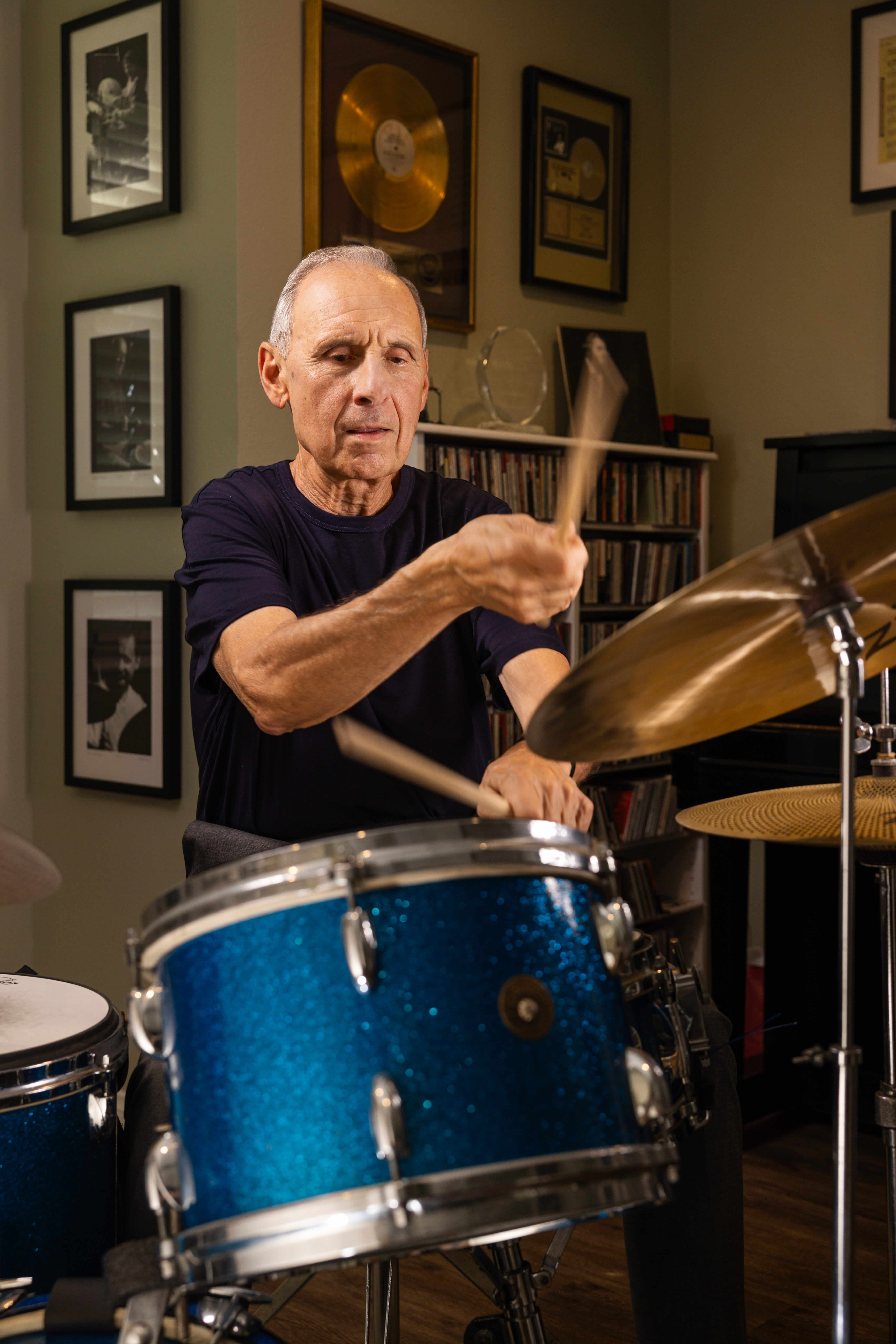 Joe playing a drumset