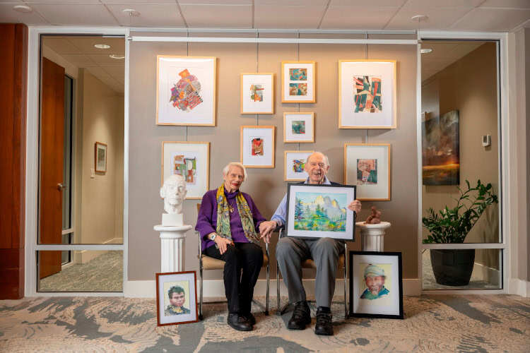 Jerry and Tania with their art collection.