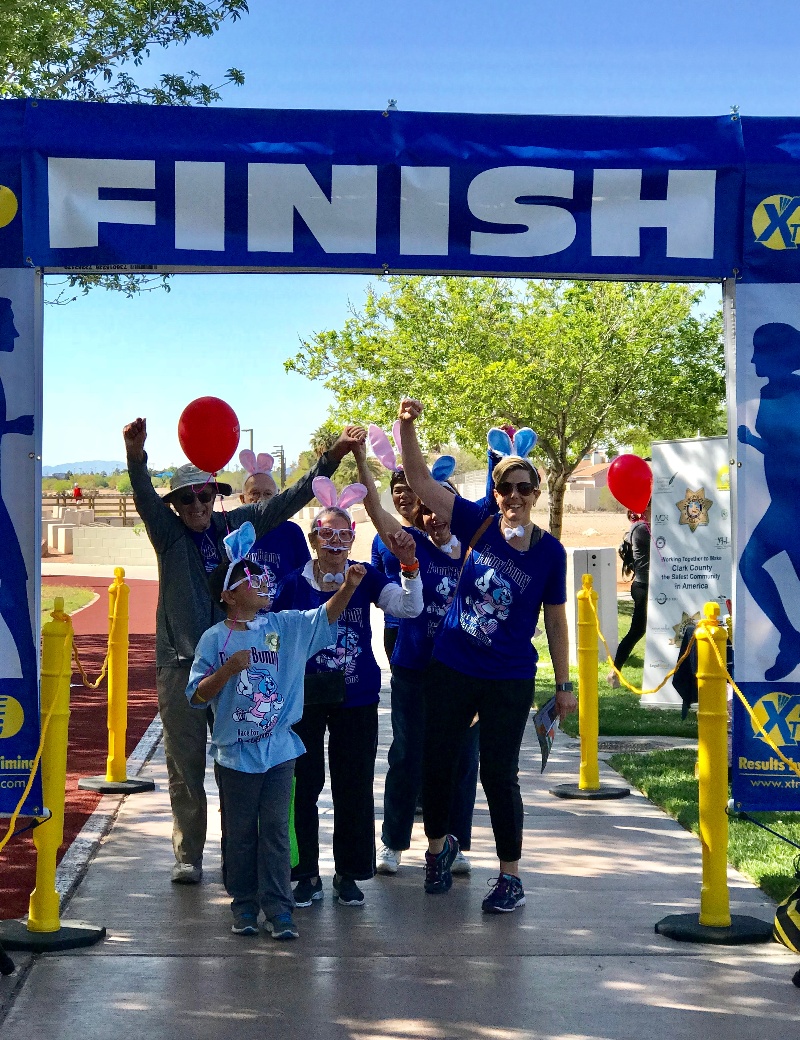 Racers celebrating at the finish line