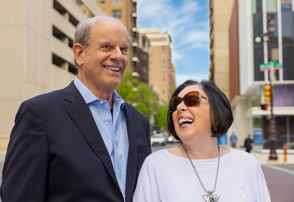 Stan and Jackie smiling in the city