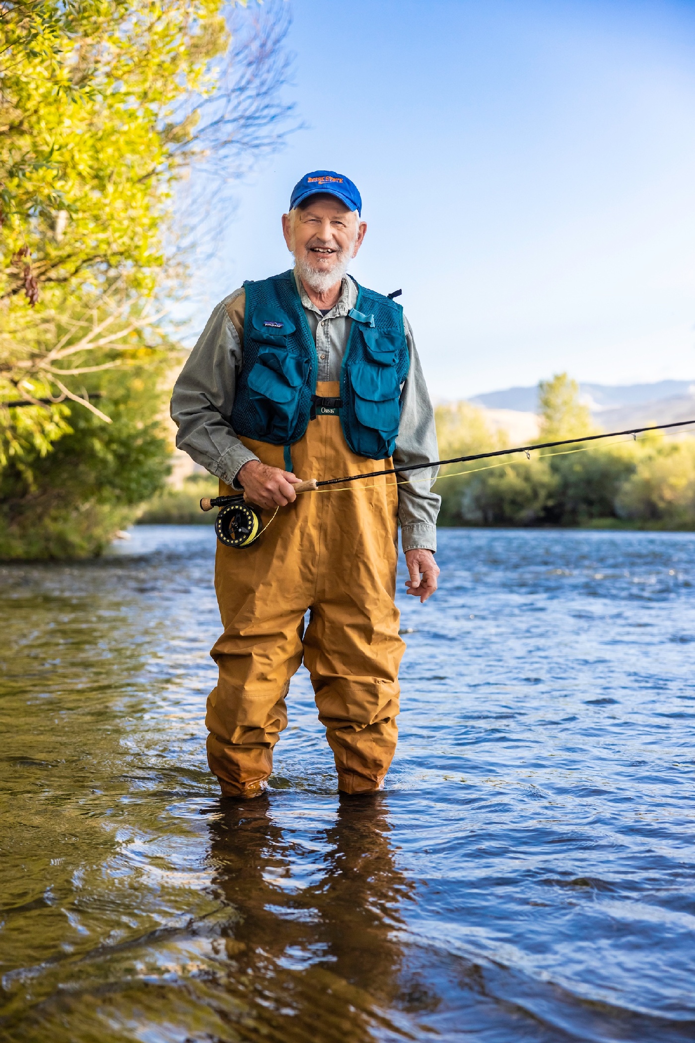Man going fishing in a stream