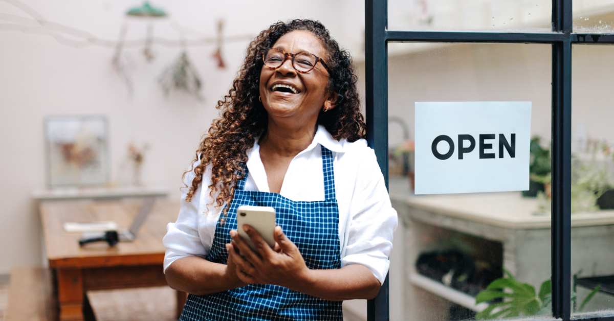 smiling woman working at a retail store