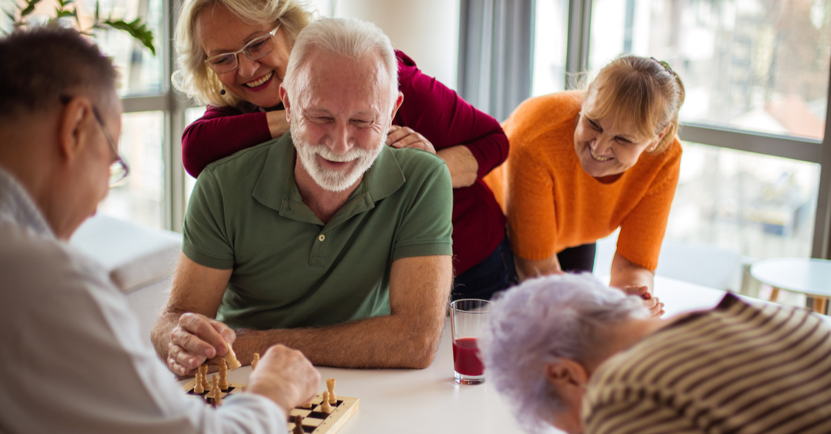 group of friends playing chess