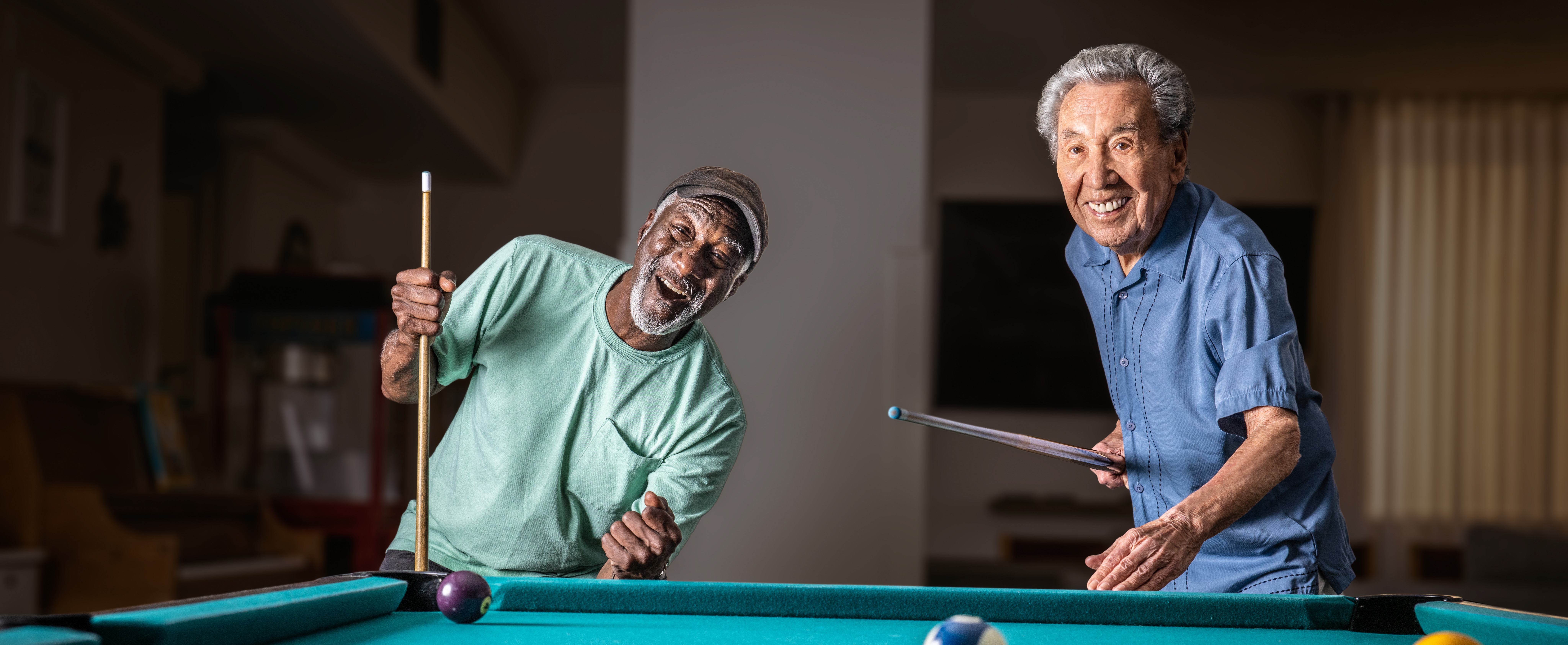 two men playing pool 