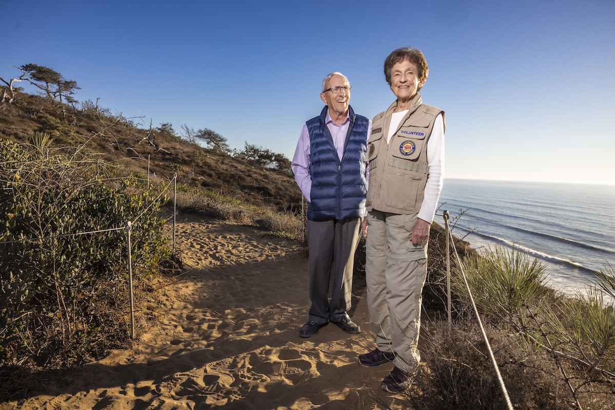 Carolyn and Cliff happily standing near the beach