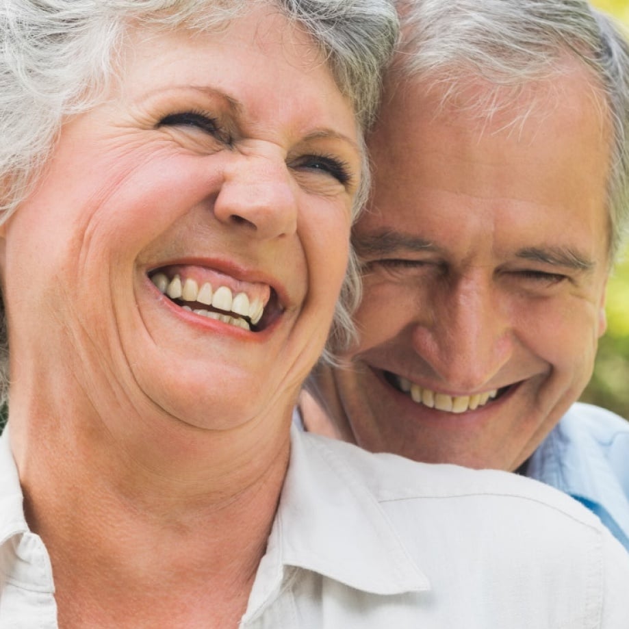 Older couple smiling together