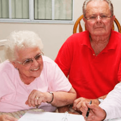 Older couple reviewing paperwork