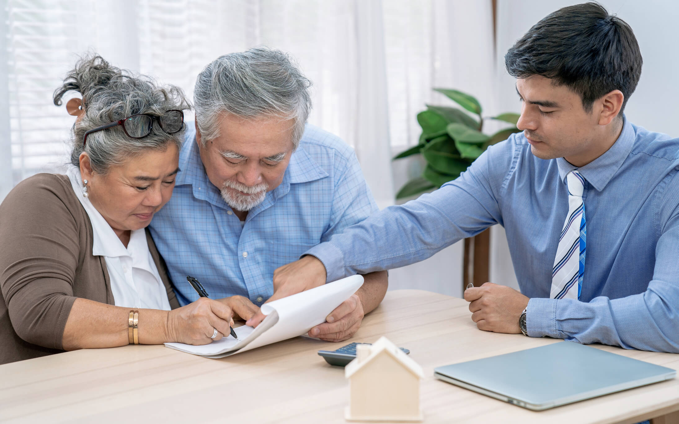 Couple looking at real estate paperwork 